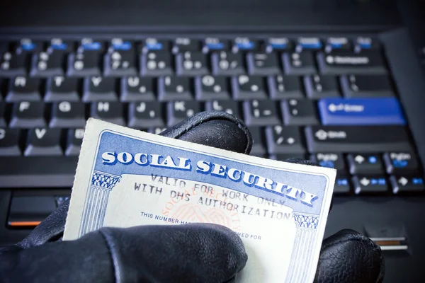 depositphotos_5362973-stock-photo-identity-theft-on-laptop-computer