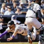 Cave impulsa 3 y Rockies vencen 9-2 a los Yankees, poniendo fin a la racha de jonrones de Judge